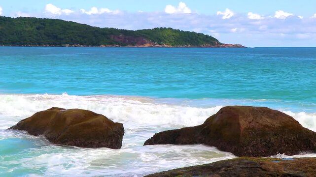 Rocks waves Praia Lopes Mendes beach Ilha Grande island Brazil.