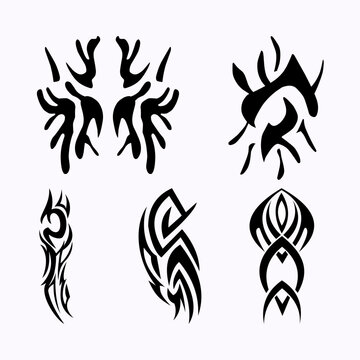 A set of four intricate black tribal tattoo designs featuring symmetrical patterns and sharp spikes. These abstract vector motifs are suitable for body art inspiration and gothic design elements.