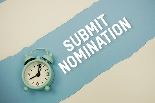 Submit Nomination with alarm clock on blue background