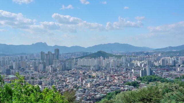 Seoul, South Korea - May. 08, 2026 : High-angle view of endless apartment complexes and urban housing in Seoul under a clear sky