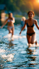 Fototapeta premium Faceless friends having fun swimming and jumping at a lake on a summer day for an outdoor recreation and lifestyle concept. Defocused lake background. Friends lake jumping, summer
