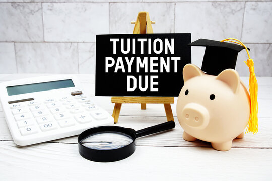 Tuition Payment Due text with mortarboard, piggy bank, calculator, magnifying glass