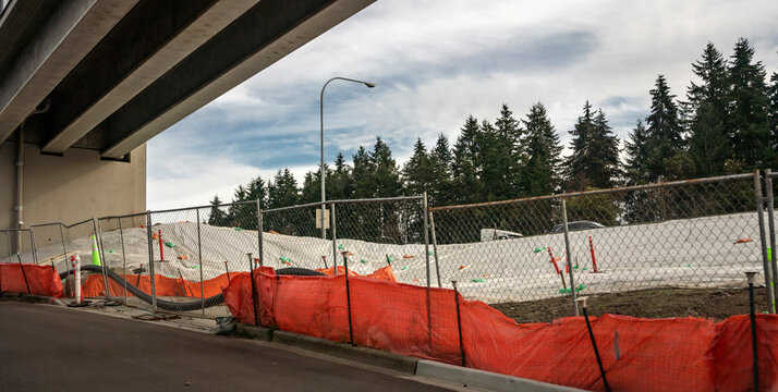 Closed-off work area under raised highway