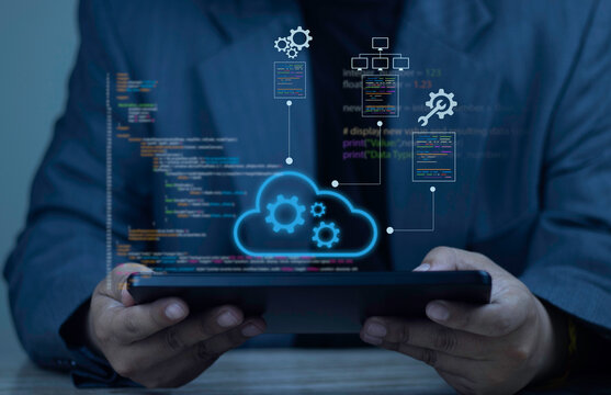 Cloud native development and infrastructure. Programmer developing applications for cloud computing with software architecture, orchestration, and source code illustrations on digital tablet.