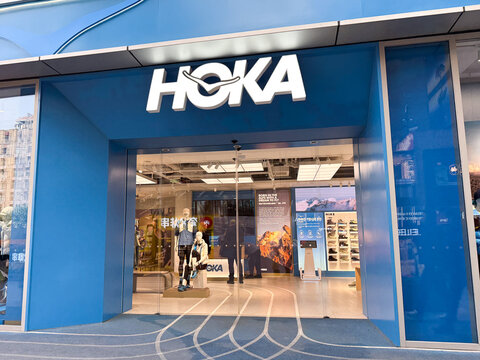 Shanghai, China - November 27, 2025: HOKA Running Shoe Flagship Store Exterior with Glass Shopfront