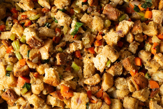 A top down view of a pile of dairy-free, gluten-free stuffing, as a background.