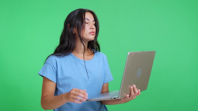 Frustrated woman experiencing laptop issue and technical error