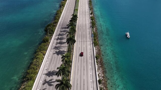 Urban traffic hyperlapse top view. Road way with car. Cars hyperlapse on causeway road. Urban roadway hyperlapse. MacArthur Causeway. Roadway Downtown Miami to Miami Beach. Car traffic road highway