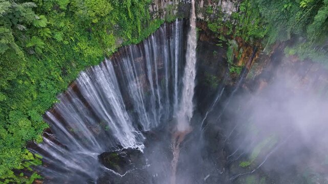 Tumpak Sewu Waterfall Drone Footage Over Dense Tropical Forest &ndash; Java Island Indonesia