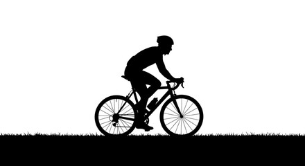 Fototapeta premium Male cyclist riding road bike silhouette on grassy terrain