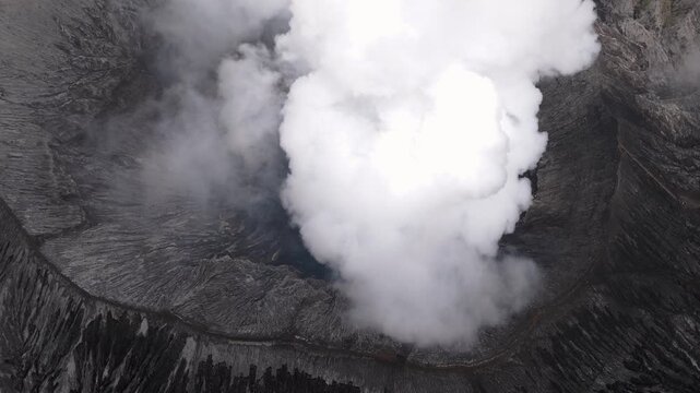Mount Bromo Volcano Surrounded by Clouds and Mountains &ndash; Java Island Indonesia