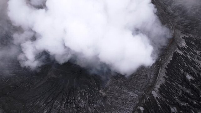 Mount Bromo Volcano Aerial Cinematic Shot with Fog &ndash; Java Island Indonesia