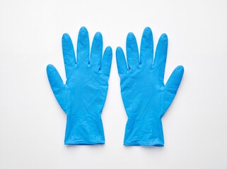 Fototapeta premium Bright blue disposable gloves, palms up, fingers slightly spread, on white background