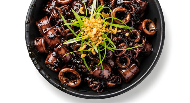 Traditional Filipino Adobong Pusit, a flavorful dish of squid cooked in soy sauce and its own black ink, isolated on white