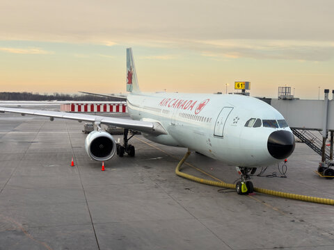 Air Canada Airbus A330 at the gate of the YUL Montr&eacute;al-Pierre Elliott Trudeau International Airport