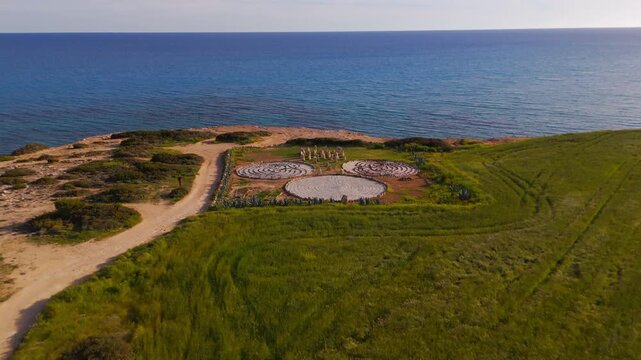 Drone Flyover Toward Mediterranean Horizon Above Stone Circle Formations Near Avdimou Bay Cyprus