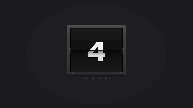 Mechanical split flap countdown timer with metallic housing frame and hinged number flip on dark background
