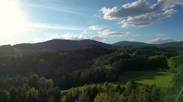 Aerial panorama of the Sonnenwald region near Ranfels and Zenting with forests, hills and cloudy sky