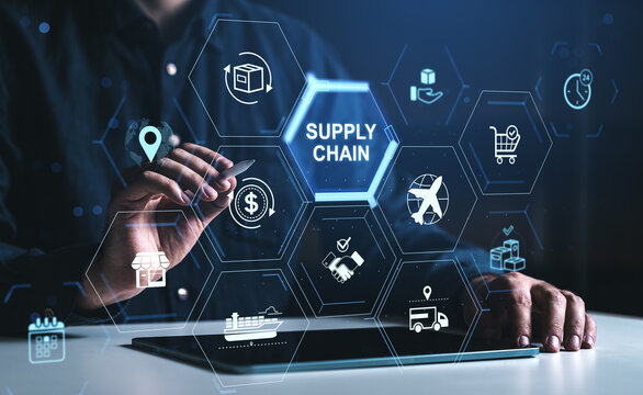Digital supply chain interface with business logistics icons on futuristic transparent screen concept illustration over workspace.