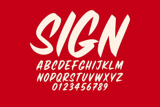 Handwritten alphabet and numbers on red background