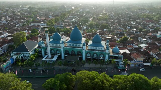 Baiturrahman Great Mosque in Banyuwangi, East Java, Indonesia landmark blue domes tall minaret