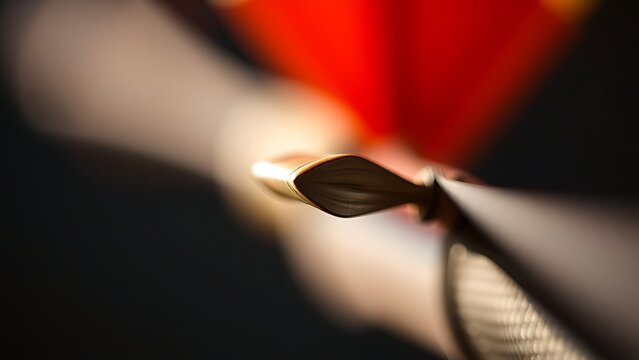 nocked. Close-up of an arrow nocked on a bowstring, dramatic side lighting. event key visuals, club posters, designed for sports event promotions and stadium branding, used by sports marketers.