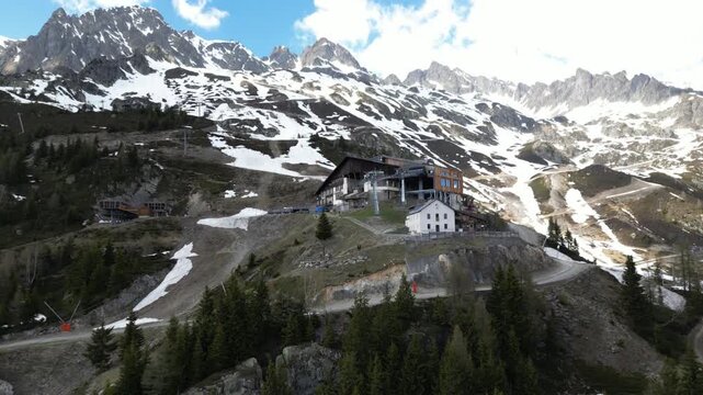 Cinematic drone view of the La Flegere mountain station and alpine refuge above Chamonix, France
