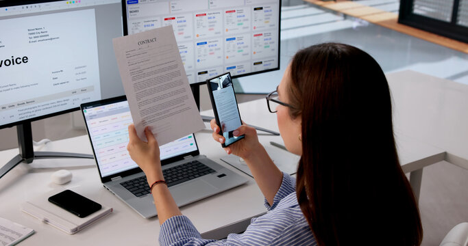 Office Manager Uses Smartphone To Scan Contract