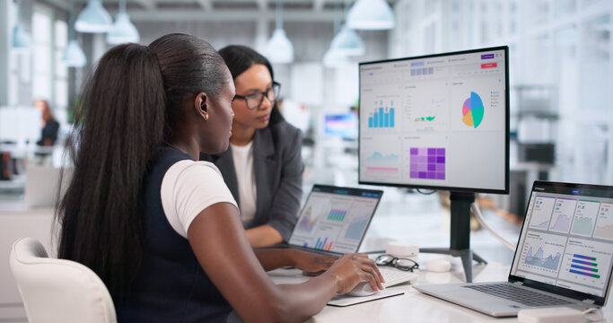 Business Analyst Reviewing Financial Dashboard Data Carefully