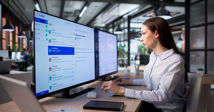 Confident Business Manager Reviews Client Emails