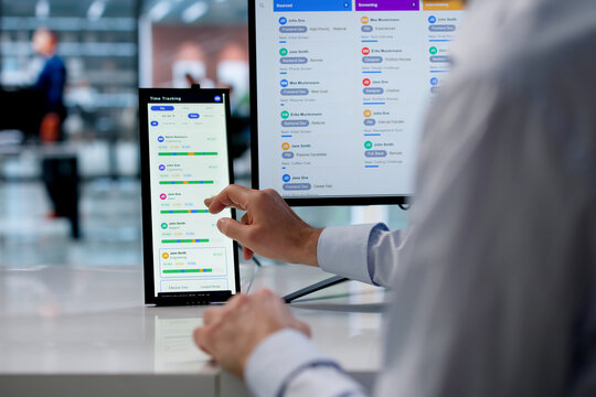 Project Manager Reviews Employee Timesheets