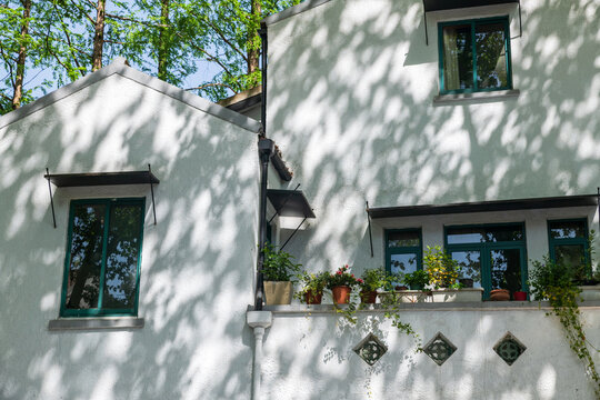 house with flower pot decor at French concession Wukang, Shanghai