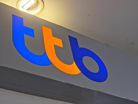 Illuminated TTB Bank Logo Signage in Blue and Orange for TMBThanachart Bankon May 9 2026 in Bangkok, Thailand.	