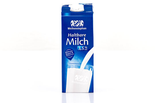 Weihenstephan long life milk 3.5 percent fat carton isolated on light background. Illustrative editorial studio product photography for dairy, grocery and beverage concepts.