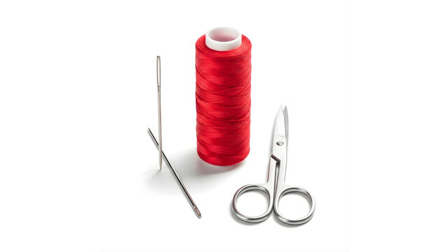 Red Sewing Thread Spool with Needles and Scissors Isolated on White Background
