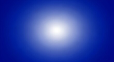 Obraz premium A bright white light shining in a deep blue background with a gradient effect