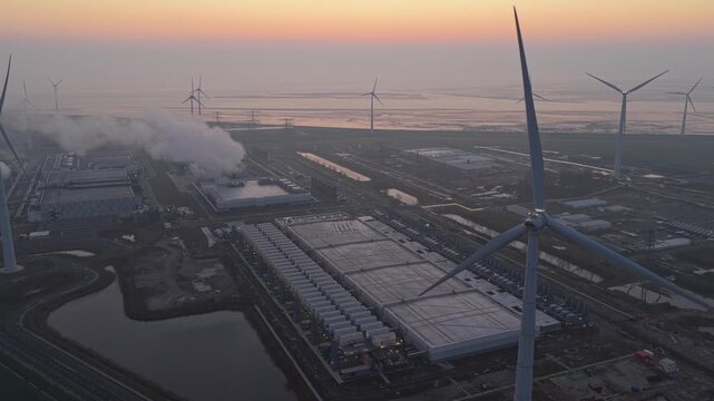 Google data center surrounded by a wind farm at sunset in netherlands