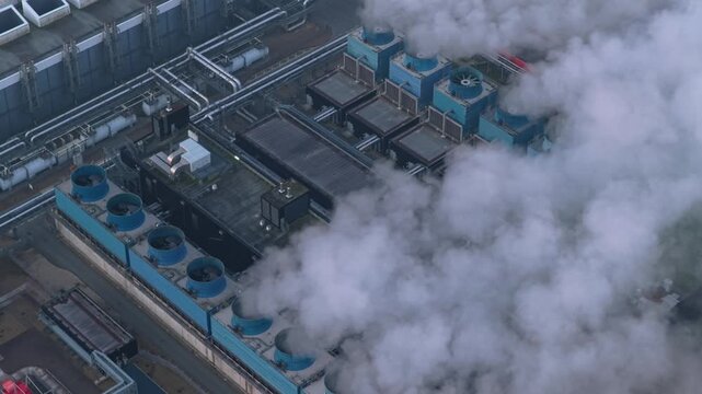 Aerial view of google data center cooling system emitting steam