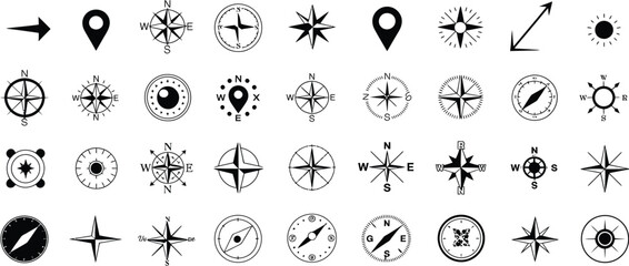 Compass Icon Collection with Vector Illustrations for Map Navigation, Travel, Cartography and Adventure Themes Featuring Classic, Modern and Abstract Direction Symbols on White © YET FAR 