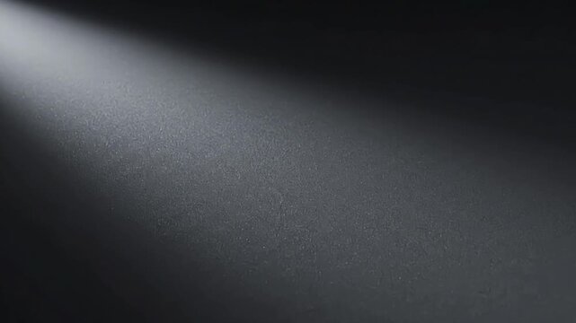 Cinematic Dark Metallic Surface with Elegant Light Beam for Luxury Brand Presentation