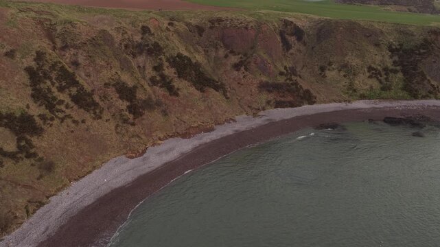 Scenic aerial view of dunnottar castle cliffs and coastline in scotland