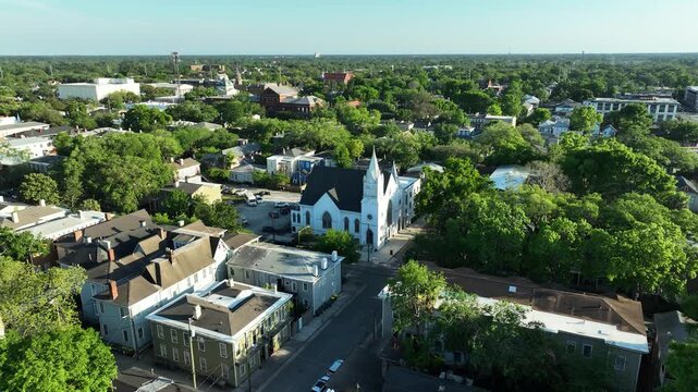 Drone clip at the corner of an intersection highlighting Saint Philip Monumental AME Church in Savanna, Georgia.