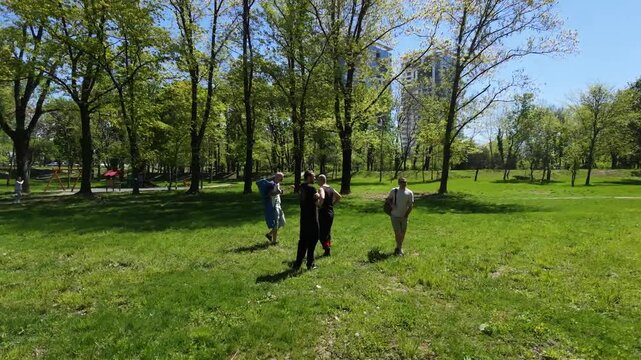 Friends reunited in park for disc golf session