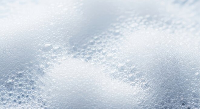 White, bubbly, thick soap lather texture covering the entire frame, suitable as a cleaning or hygiene abstract background pattern, closeup, delicate, bubbles