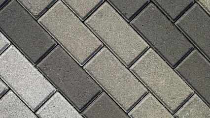 The texture of pattern of laying paving blocks, top view © Liada