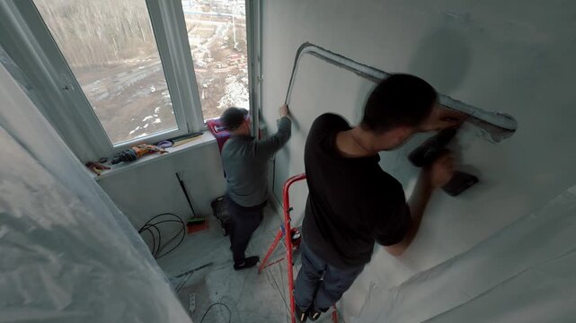 Empty room during air conditioner installation timelapse