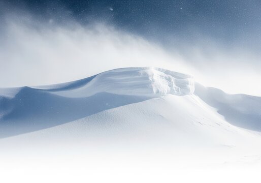 Intense winter weather scene featuring heavy falling snow and a large, towering snowdrift blocking the view during a severe blizzard environment, weather, cold, whiteout