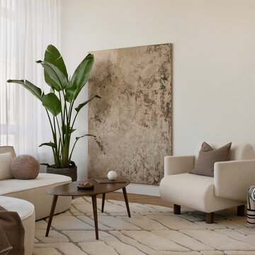 Cozy modern interior with layered textures, sculptural vases, and soft neutral tones.