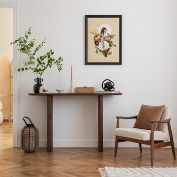 Cozy and stylish interior of living room with mock up poster frame, wooden console, flowers in vase, decorations and personal accessories. Modern home decor. Template.