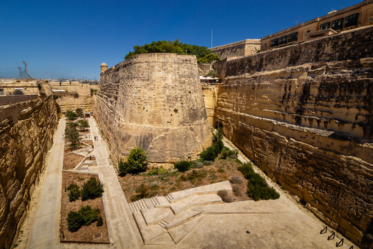 Modern architectural view of the City Gate and historic bastions in Valletta